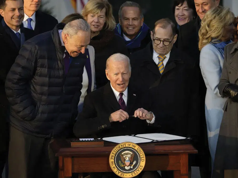 Biden signs gay marriage law, calls it a blow against hate
